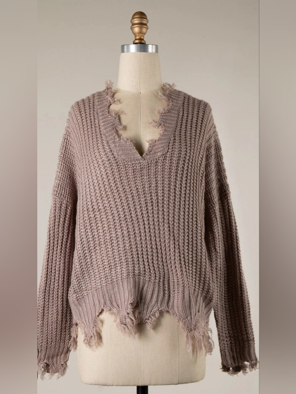 HYFVE V-Neck Knit Sweater features a distinct grunge-inspired, bohemian Look. Sm